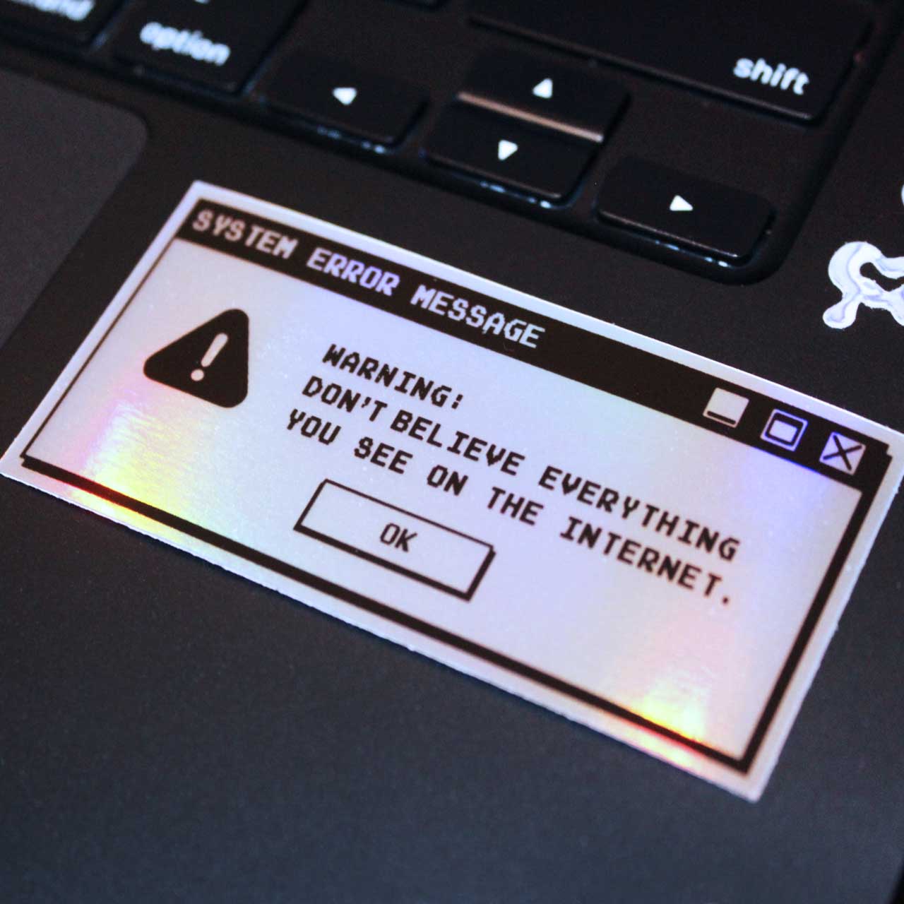 Computer pop up window error message cybercore aesthetic sticker on a laptop