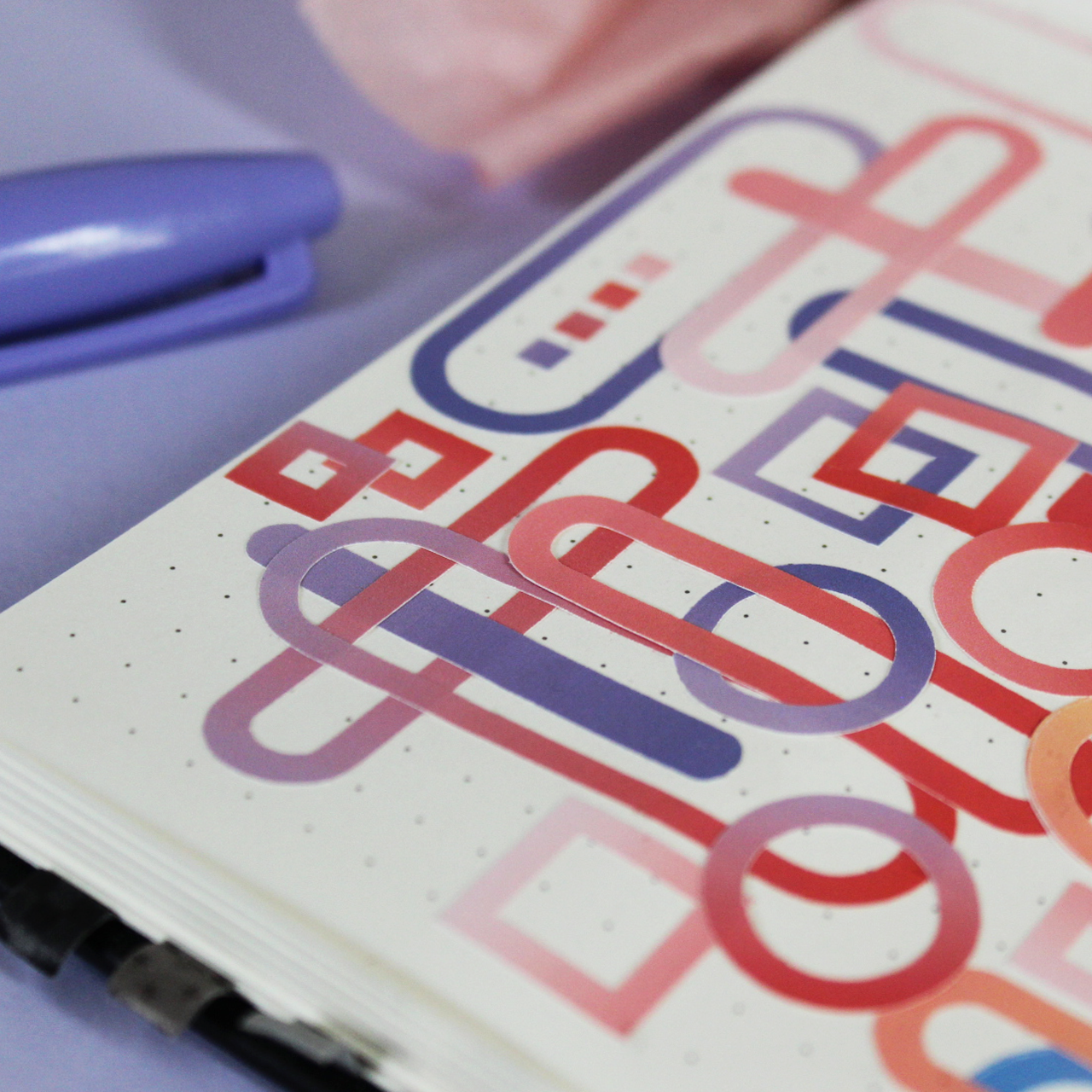 Light pink, red, light purple, dark purple gradient sticker sheet with oval, circle, and square shapes