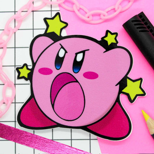 Pink Kirby sticker with yellow stars in background