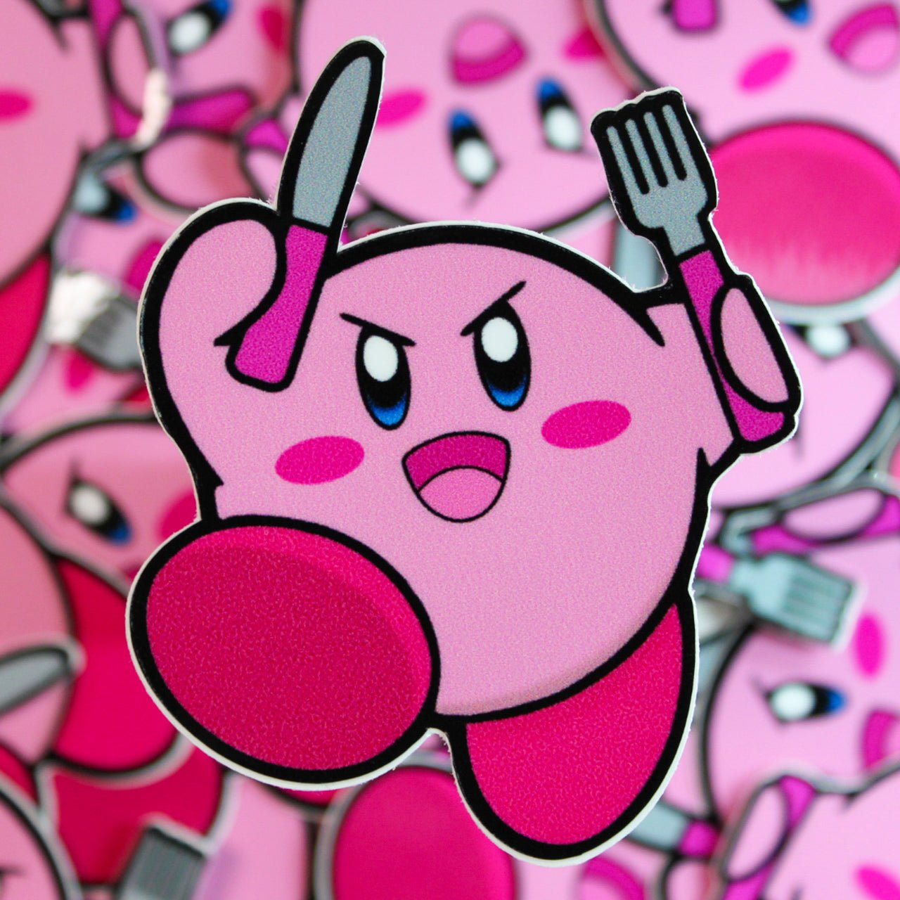 Kirby vinyl sticker, kirby holding a knife and fork. 