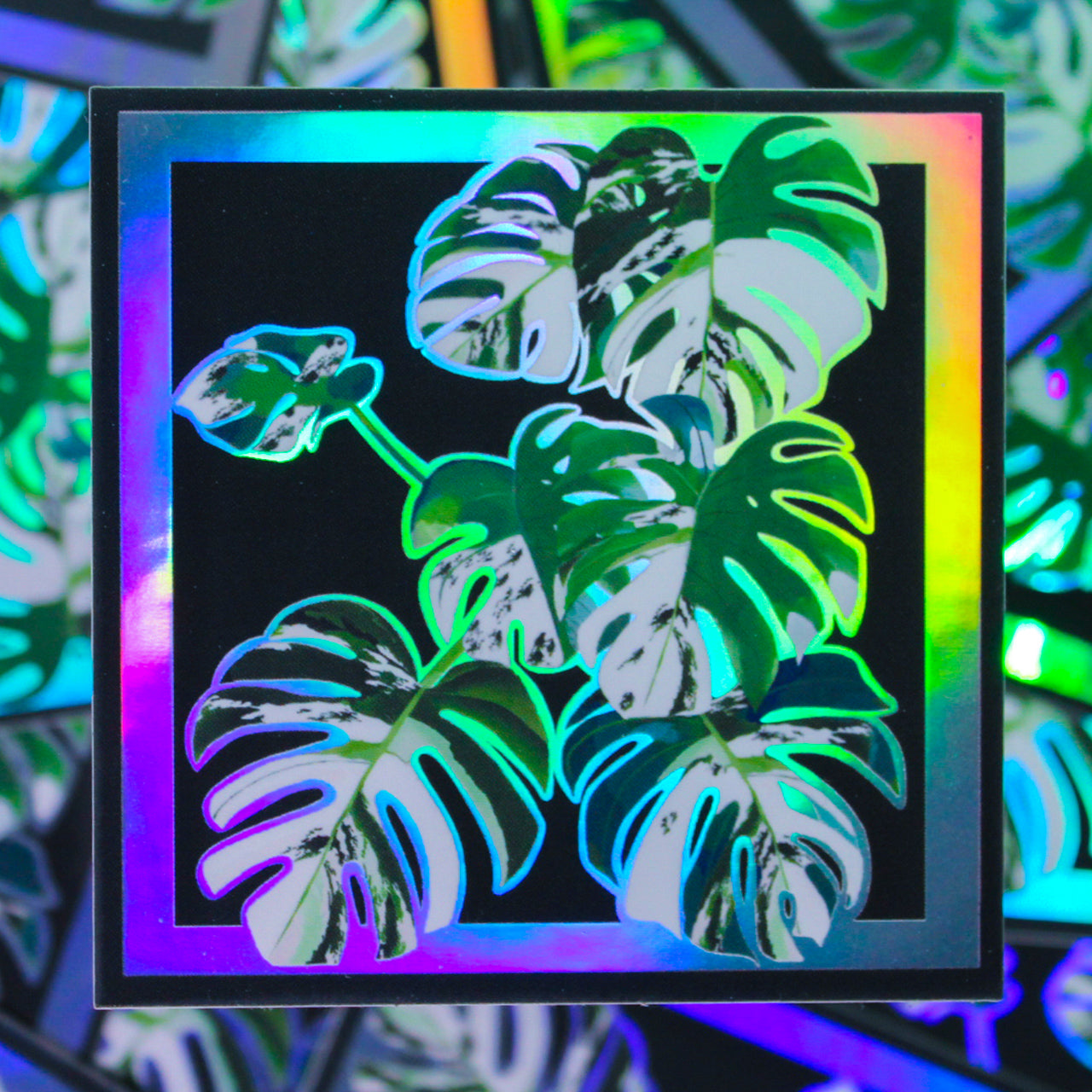 Monstera plant sticker with holographic background.