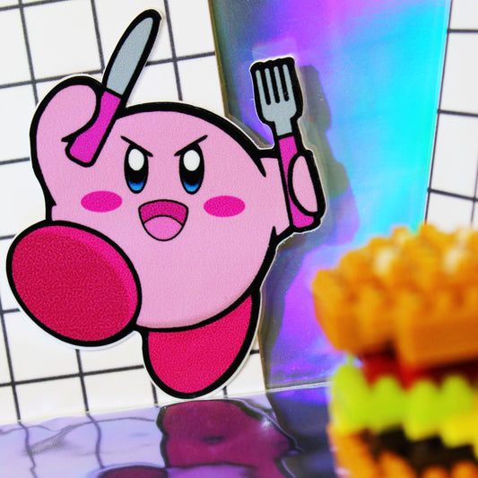 Pink Kirby holding knife and fork
