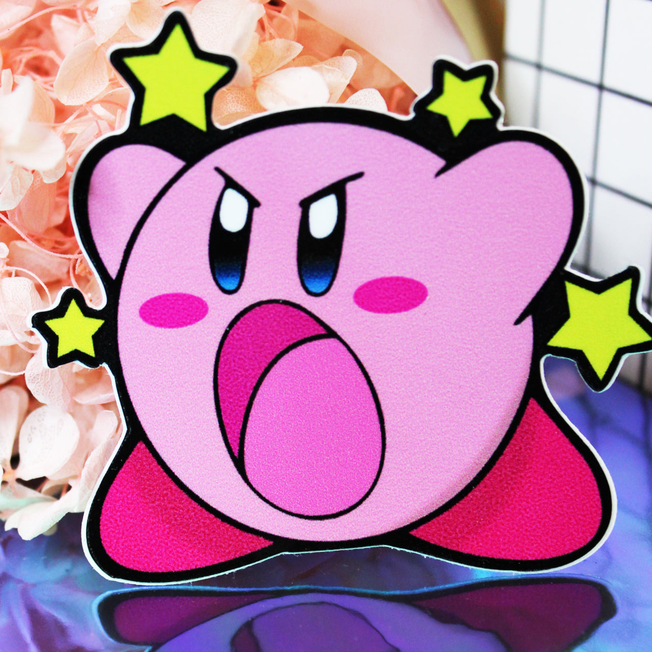 Kirby with yellow stars in background