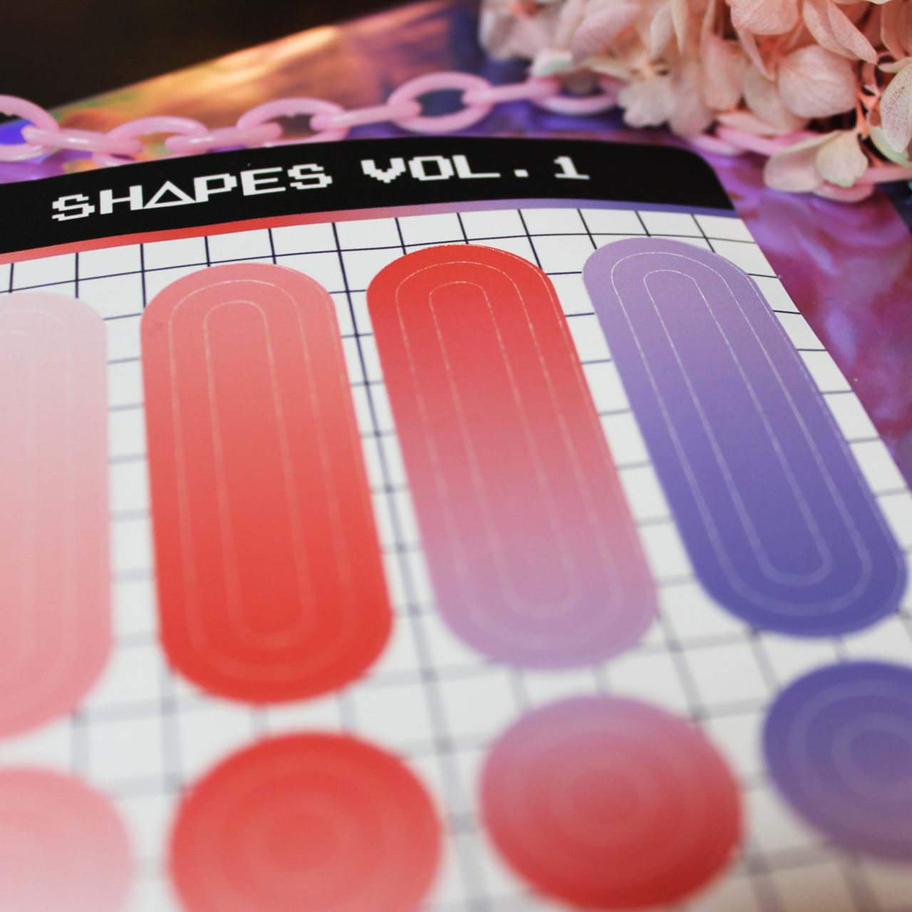 Light pink, red, light purple, dark purple gradient sticker sheet with oval, circle, and square shapes