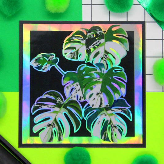 Monstera plant sticker with holographic background.